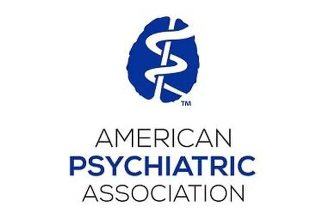 Logo of the American Psychiatric Association featuring a blue silhouette of a brain with a white snake wrapped around a staff. Below, the text reads AMERICAN PSYCHIATRIC ASSOCIATION with PSYCHIATRIC in bold blue letters.